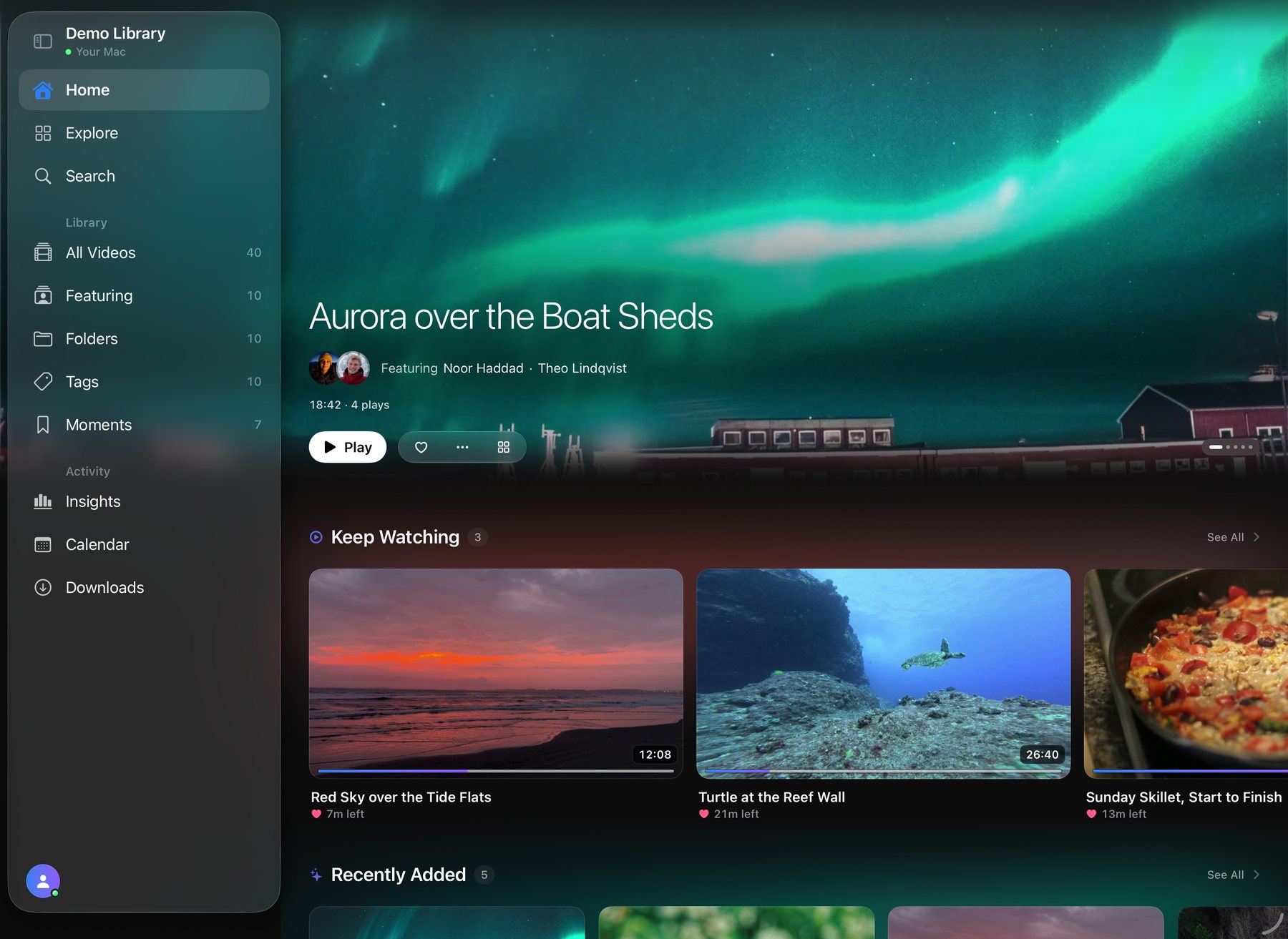 Sprocket Home on an iPad in landscape: the library sidebar on the left, a featured video of an aurora across the top, and a Keep Watching shelf below.
