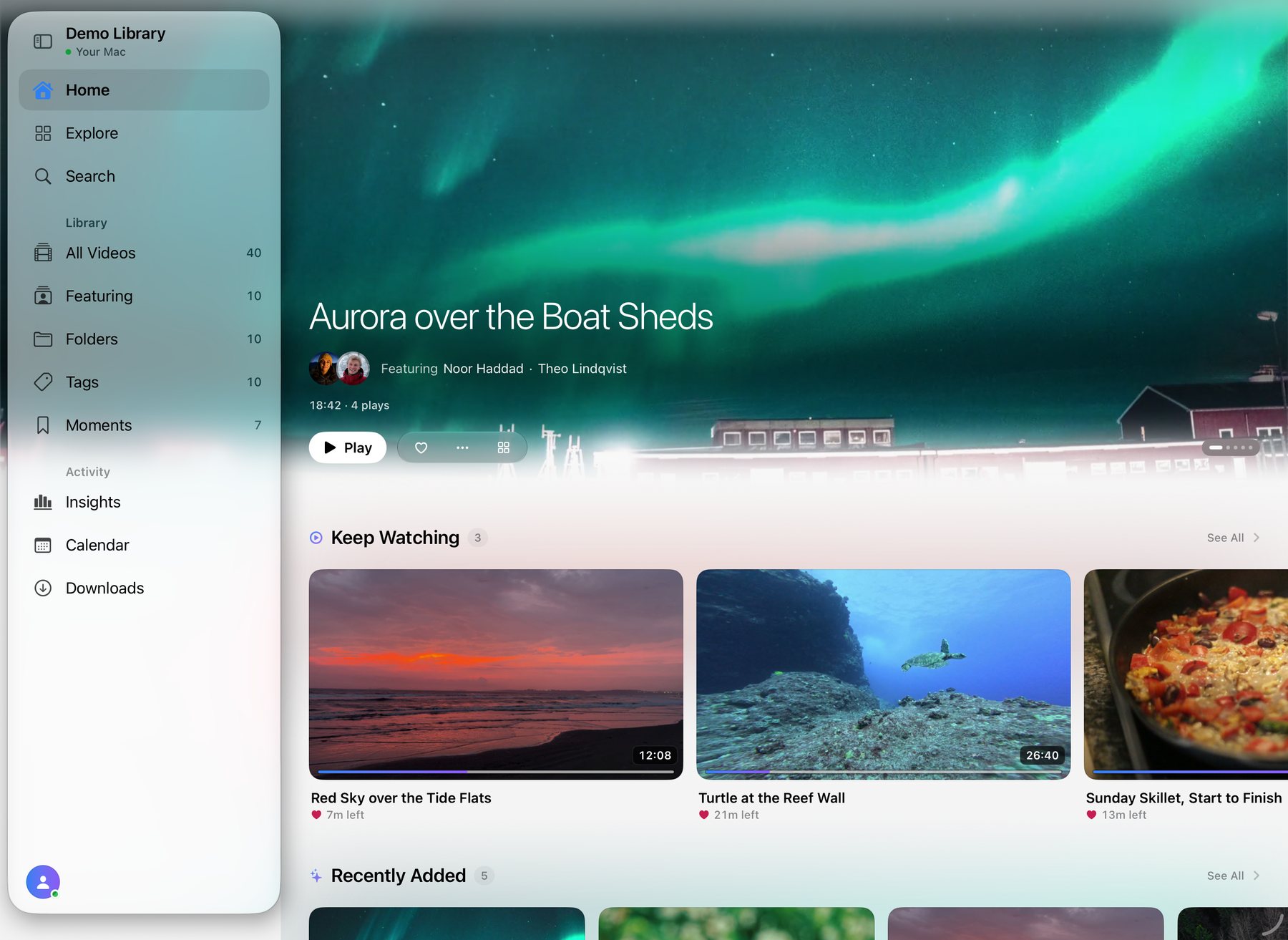 Sprocket Home on an iPad in landscape: the library sidebar on the left, a featured video of an aurora across the top, and a Keep Watching shelf below.