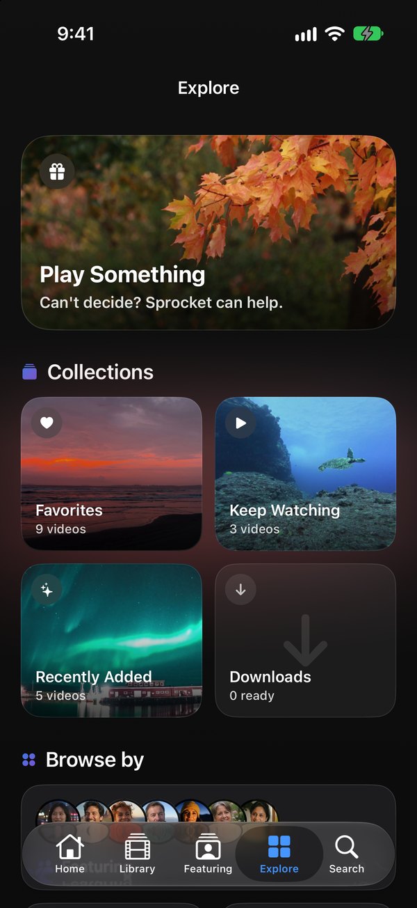 Explore on iPhone: a Play Something card above collections for Favorites, Keep Watching, Recently Added and Downloads.